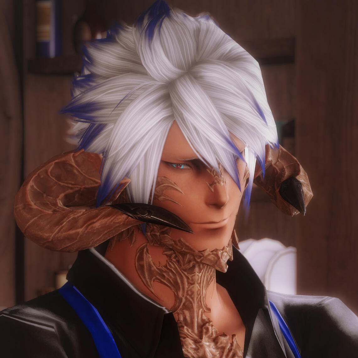 An Au Ra man with blue hair tips